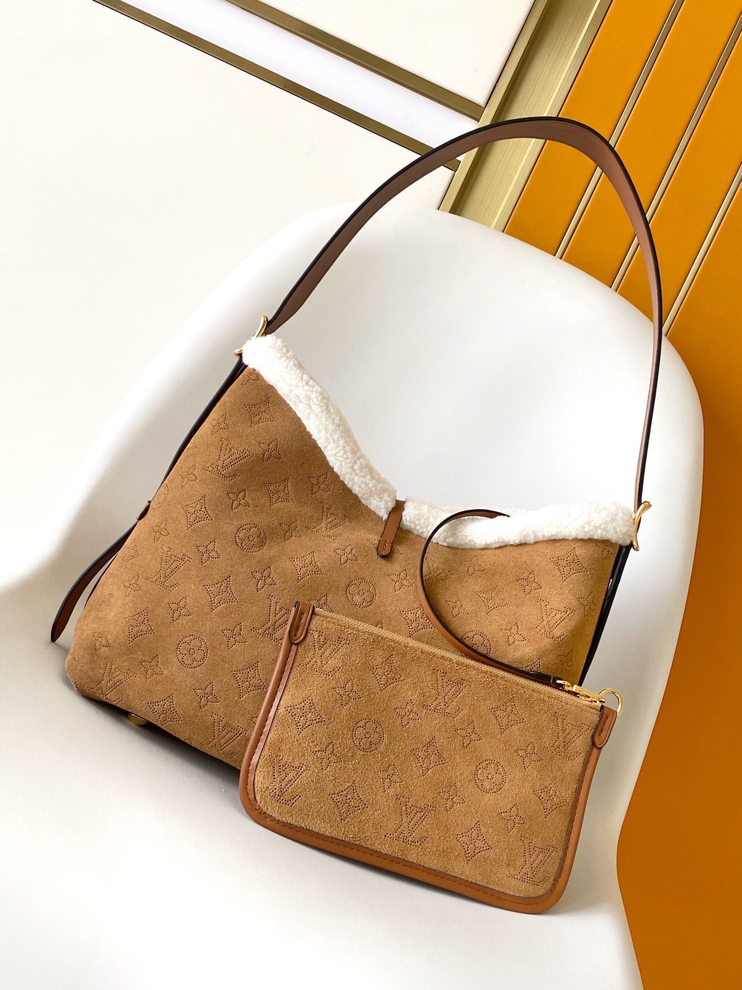 M11843 CarryAll Small Bag by Louis Vuitton LV from the Ski Collection
