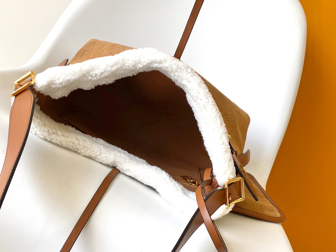 M11843 CarryAll Small Bag by Louis Vuitton LV from the Ski Collection